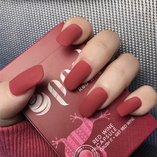 Matte Red manicure with false nails